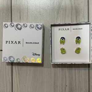 Disney Pixar x BaubleBar Mike Wazowski earrings.